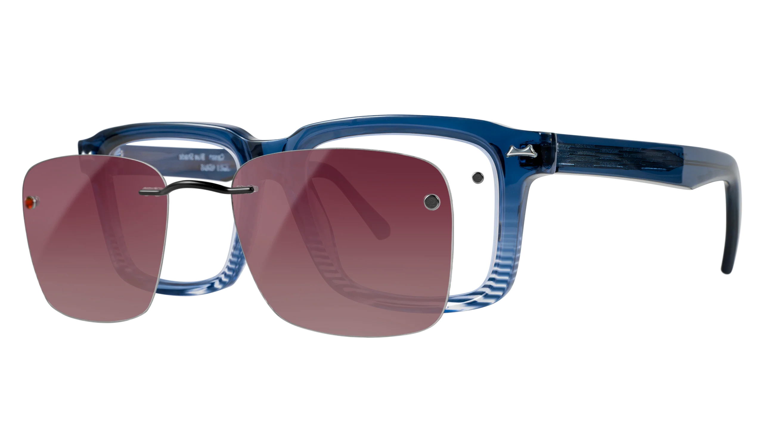 Chemistrie magnetic clip lens lifting off a blue frame, showing the two tiny magnets set into the prescription lens